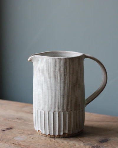 CARVED JUG